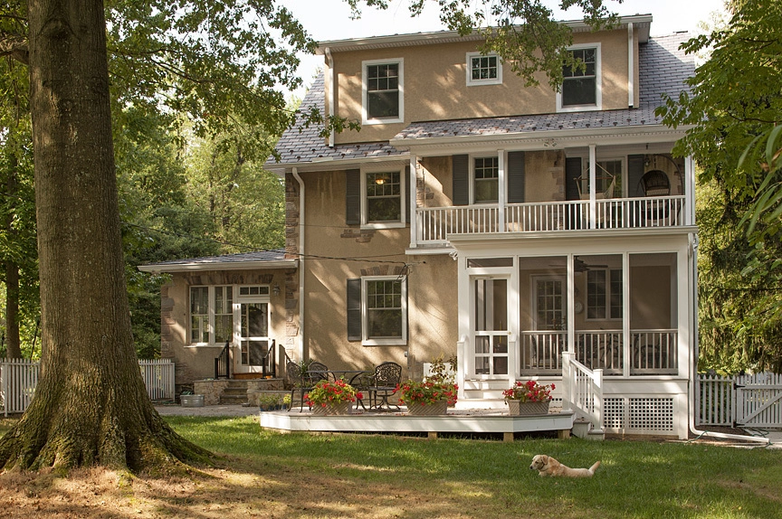 Covered porch that expands outdoor living space on an Owings Mills, MD home
