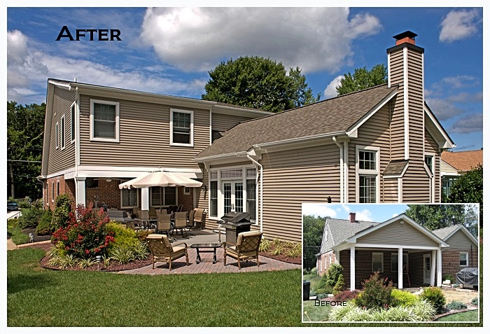 Beautifully remodeled home exterior with new siding, patio seating, and garden landscaping in Catonsville.