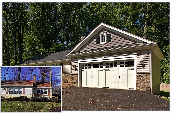 Modern home exterior featuring a new garage door and stone accents, surrounded by lush green trees.